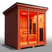 Medical Saunas Nature 8 Plus Outdoor Infrared and Steam Sauna front view angled significantly right looking inside through glass with orange affect from lighting inside and good view of one side externally