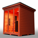 Medical Saunas Nature 8 Plus Outdoor Infrared and Steam Sauna front view angled very left looking inside through glass with orange affect from lighting inside and complete view of one side externally