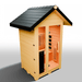 Medical Saunas Nature 5 Outdoor Infrared Sauna front view angled slightly right, downward angle showing a lot of the sloping roof and a view through the windows to the warmly lit inside