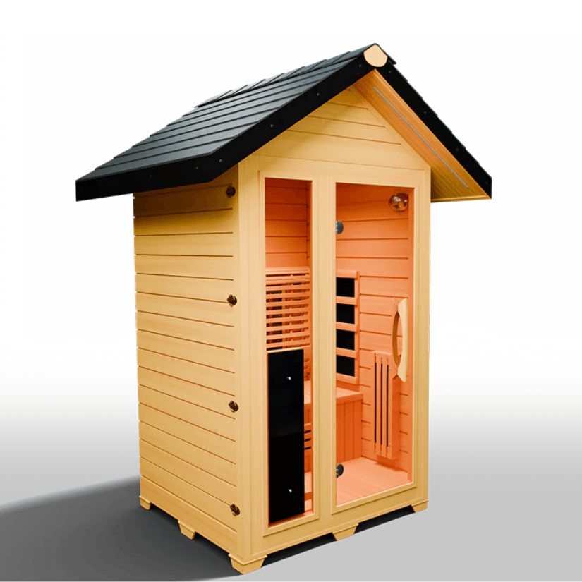 Medical Saunas Nature 5 Outdoor Infrared Sauna front view angled slightly right, view through the windows to the warmly lit inside, good view of the floor