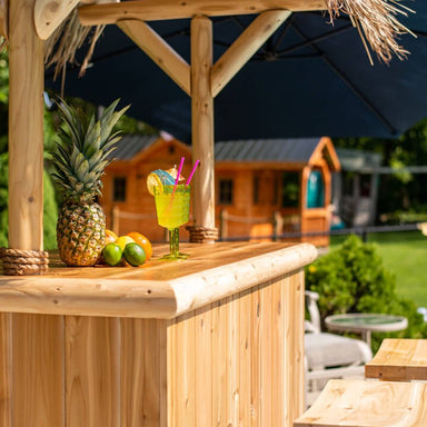 Dundalk Leisurecraft Southern Fantasy Tikibar with cocktail on the bar